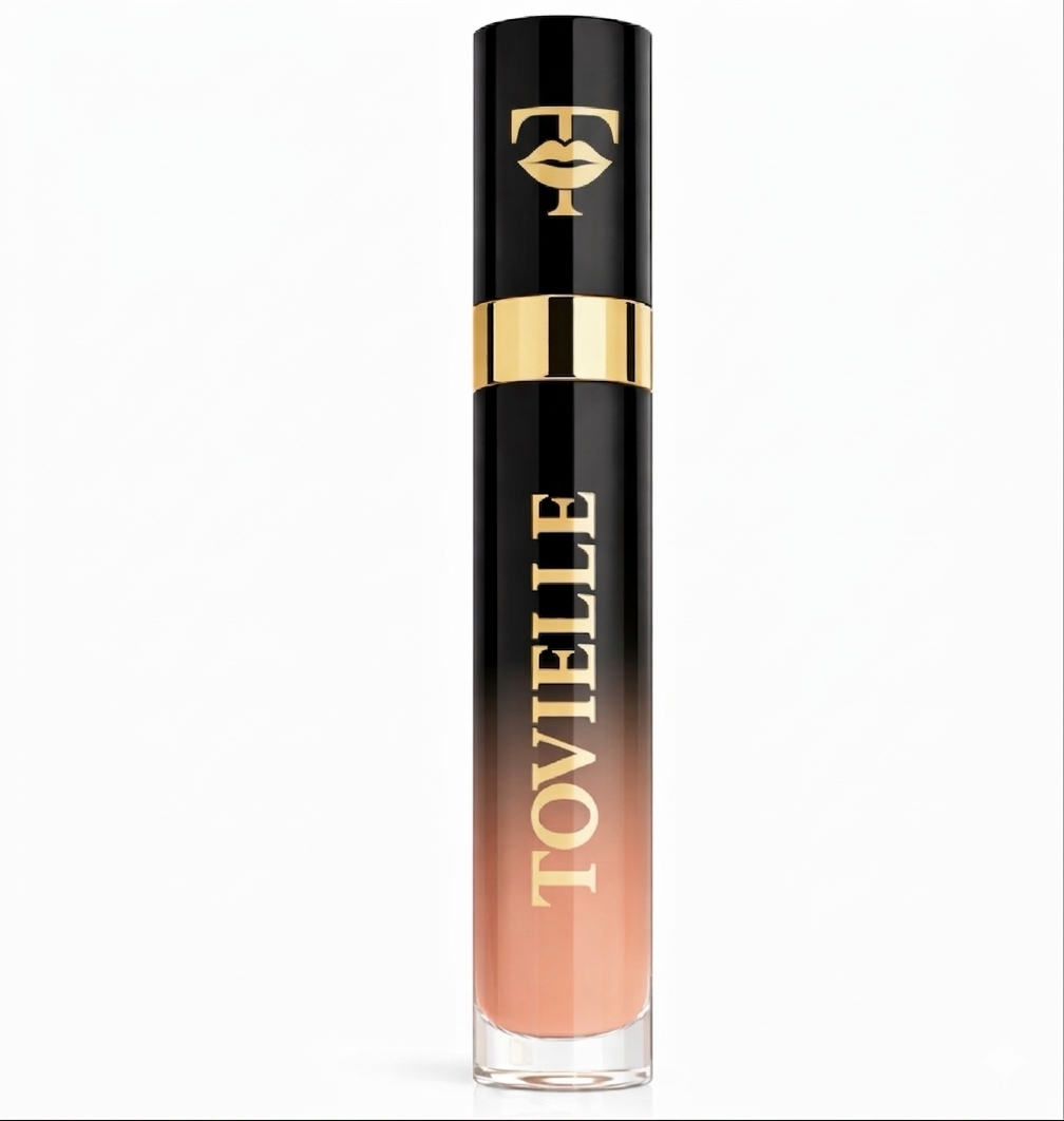 Nude Peach lip gloss by Tovielle. Soft peach nude shade with a glossy high-shine finish