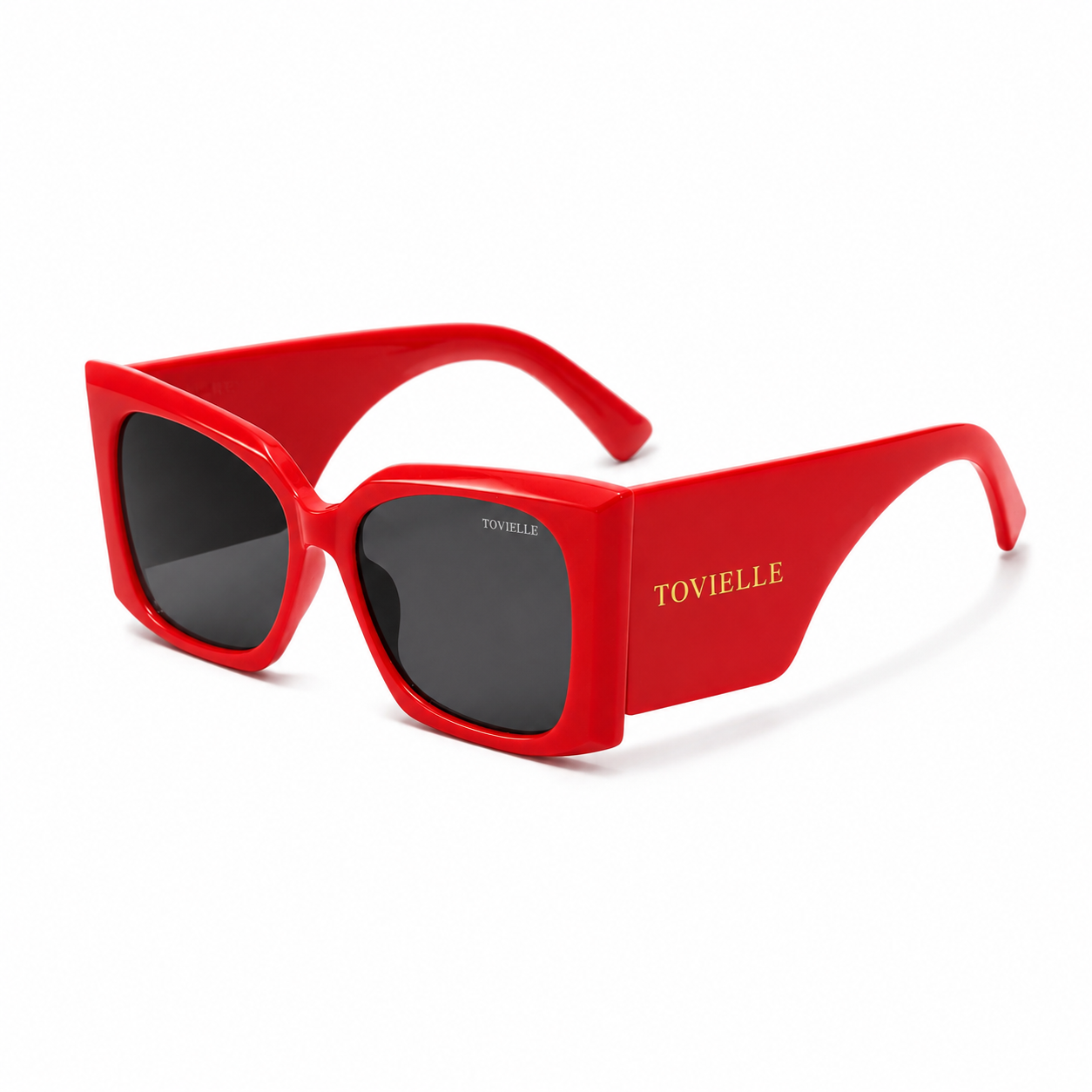 Tovielle Riviera Rouge luxury sunglasses featuring an oversized red frame, dark tinted lenses, and signature gold logo detailing on a clean studio background.