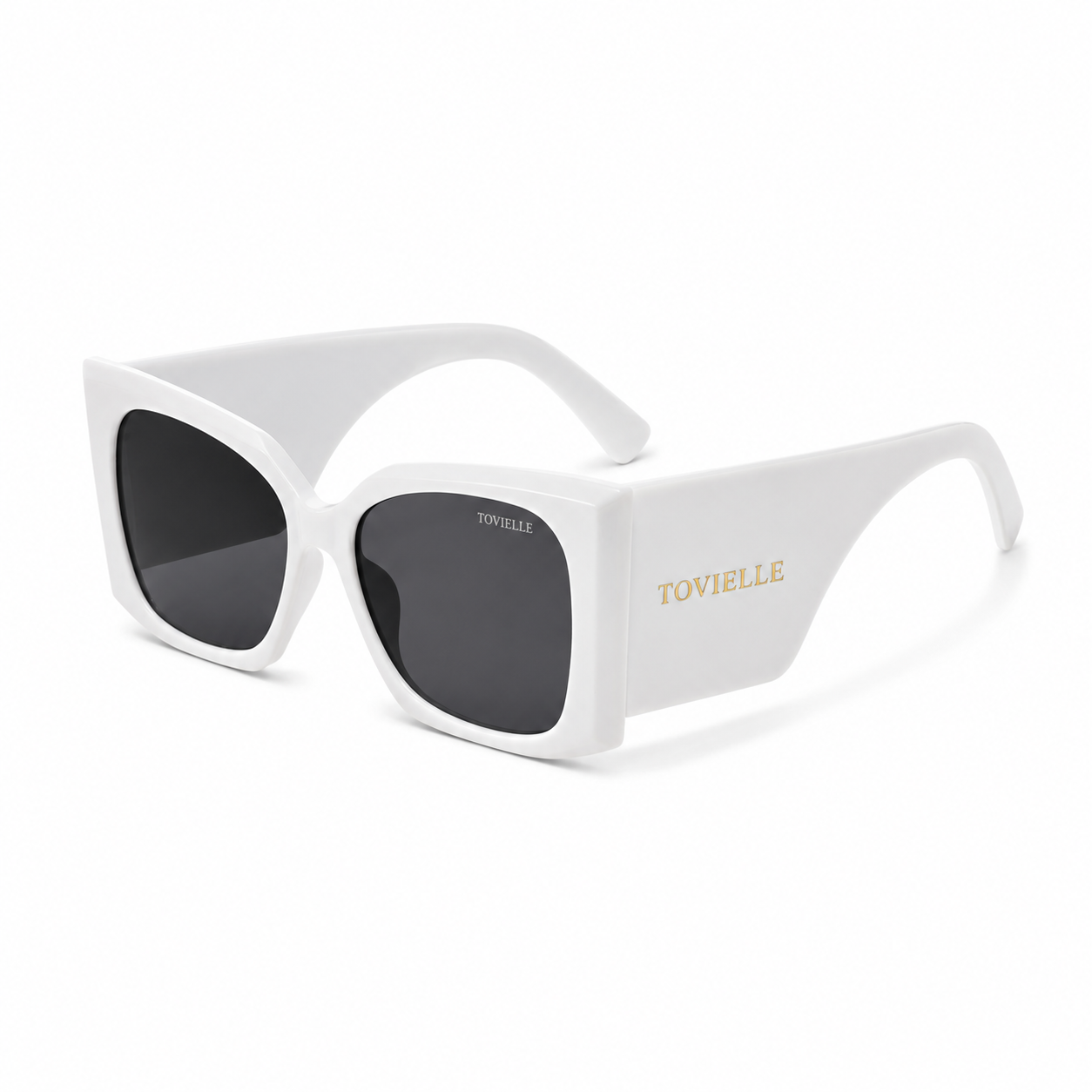 Tovielle Riviera Blanc luxury sunglasses featuring an oversized white frame, dark tinted lenses, and signature gold logo detailing on a clean studio background.