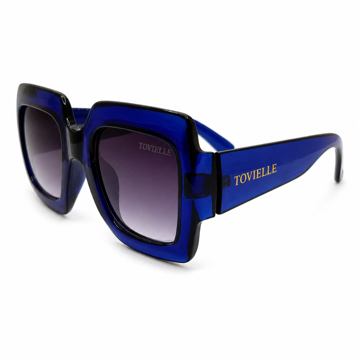 Oversized sapphire blue Heiress sunglasses by Tovielle with gradient lenses and gold logo detail