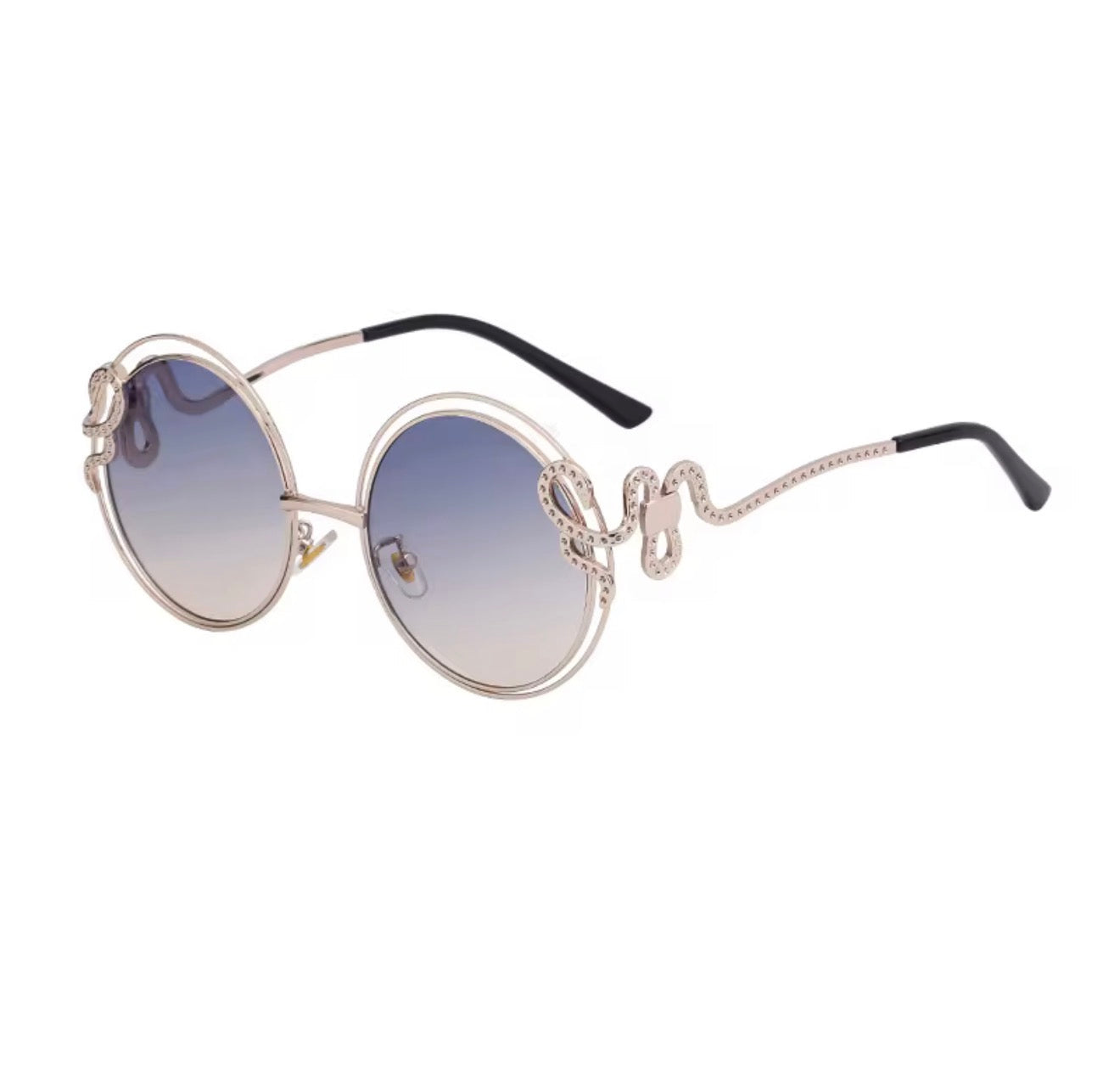 Sunglasses with decorative frame and gradient lenses on a white background